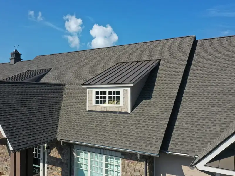Gray shingle roof with dormer window
