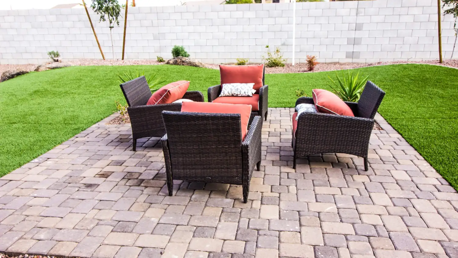 Outdoor patio with brick pavers and seating